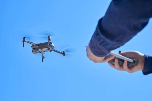 person operating drone person operating drone