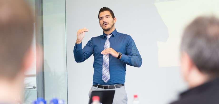 business man presenting in meeting room